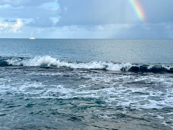 Caribbean sea, with a yatch and rainbow